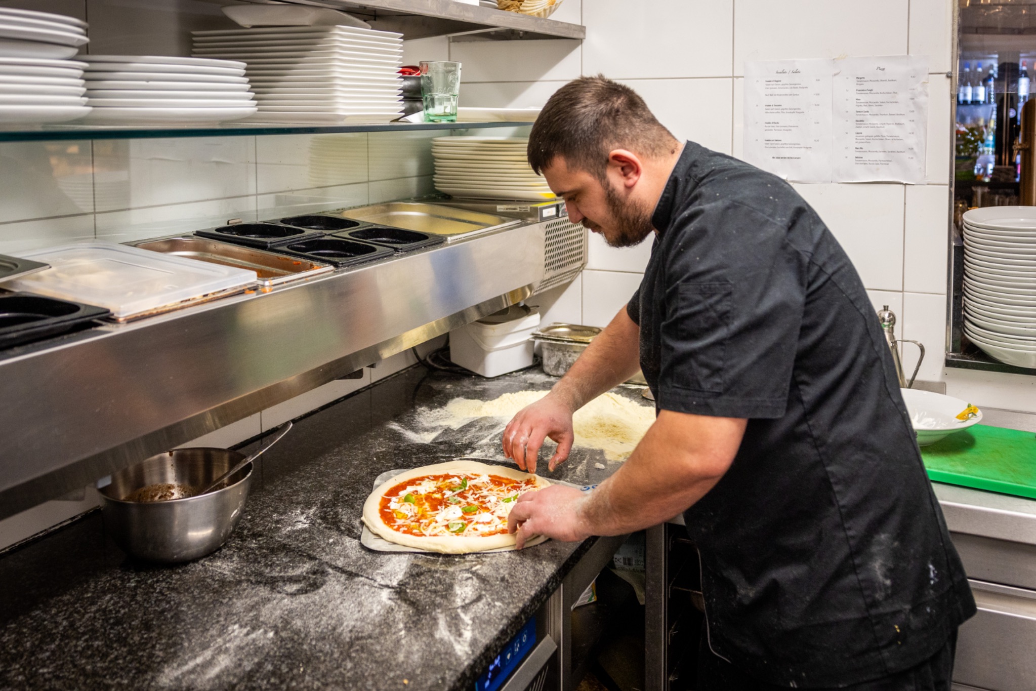 Restaurant toscanino pizza zubereitung totale